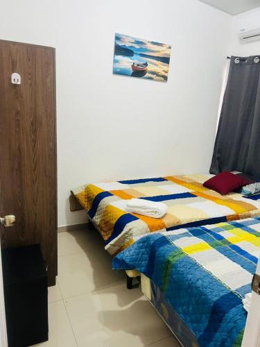 Ένα ή περισσότερα κρεβάτια σε δωμάτιο στο VillaOriental