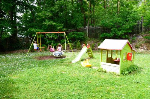 a group of children playing on a playground at Parkhotel Zirndorf in Zirndorf