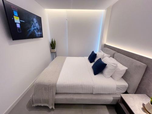 Ένα ή περισσότερα κρεβάτια σε δωμάτιο στο New studio in Quito's heart