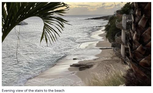 a view of the brink of the brink to the beach at Cheerful Seascape Condo Happy Haven at Rainbow Beach Club in Cupe Coy