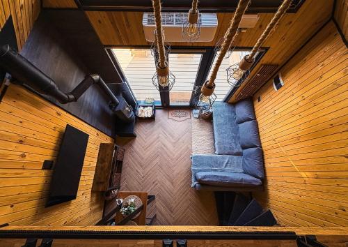 an overhead view of a living room in a house at Fanar Chalet in Glodu