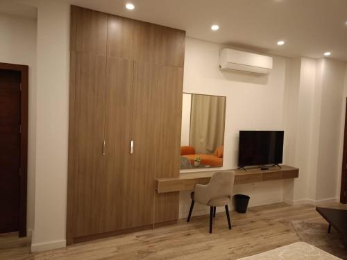 TV a/nebo společenská místnost v ubytování Maison 7 Mirage Resort