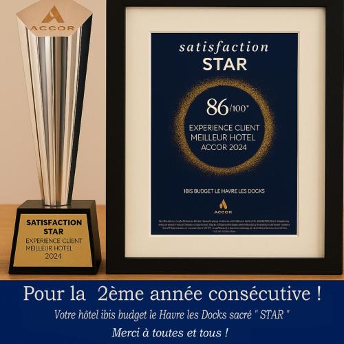 a framed framed picture of ahibitionhibitionhibitionhibitionhibitionhibitionhibitionhibitionhibitionhibition at Ibis Budget Le Havre Les Docks in Le Havre