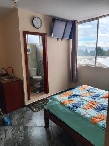 Postel nebo postele na pokoji v ubytování Apartamento