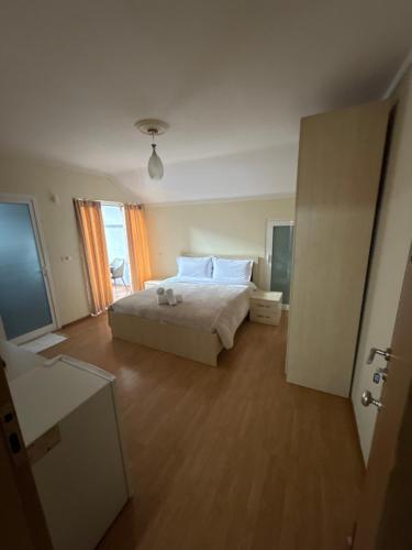 Ein Bett oder Betten in einem Zimmer der Unterkunft Bar-Hotel IRDI