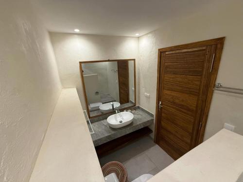 Postel nebo postele na pokoji v ubytování Agence Adjana Resort - Résidence Les Alizées