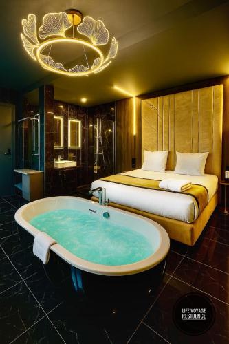 Foto LiFE VOYAGE RESIDENCE & SPA - Strasbourg's City Center Luxury Experience 1