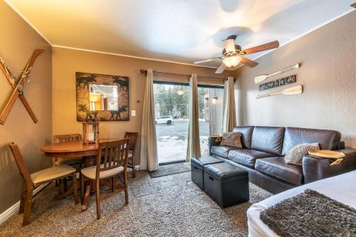 a living room with a couch and a table at 132 Bldg C condo in Truckee