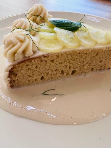 a piece of cake on a white plate at Hotel Mamá Dolores in Dolores Hidalgo