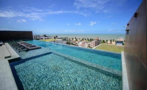 Hồ bơi trong/gần HOLANDAS PRIME RESIDENCE - perto de TUDO