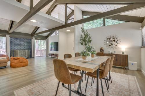 a dining room with a table and chairs at 3 Mi to Lake Arrowhead Cabin with Furnished Deck! in Twin Peaks