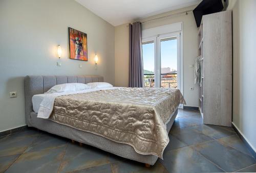 Postel nebo postele na pokoji v ubytování Aldebaran Hotel Apartments