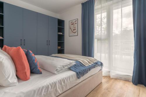 Ένα ή περισσότερα κρεβάτια σε δωμάτιο στο APARTIO ROOMS Zabrze