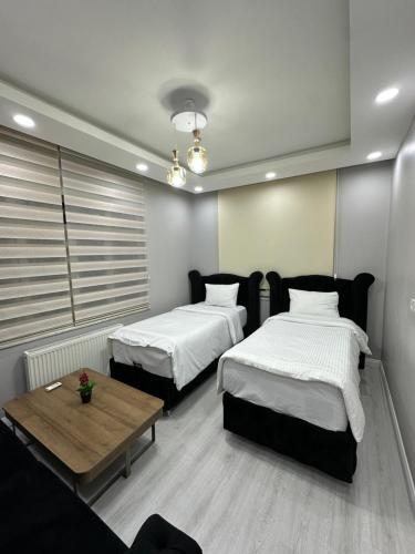Postel nebo postele na pokoji v ubytování Sultanahmet Immortelle Apartment