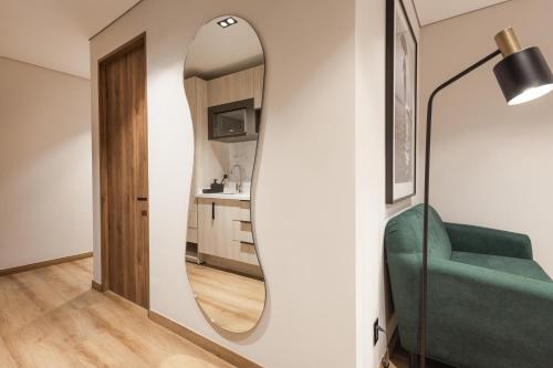 Kuchyň nebo kuchyňský kout v ubytování Vuestro Hotel Boutique