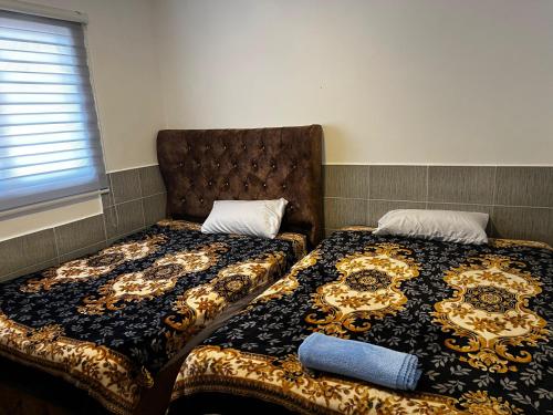 a bedroom with a bed and a pillow on it at YelaMar House in Ciudadela Costa de Oro