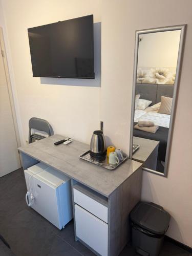 Un televizor și/sau centru de divertisment la Blue Tree Rooms