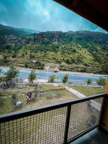 a view of a river from a balcony at Bela Resorts Naran in Nārān