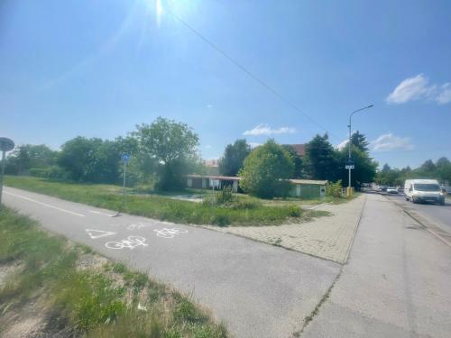 a bike lane on the side of a road at Apartman Cañas Zelená Víla in Rimavská Sobota