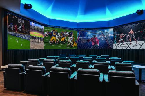 a room with a large screen in a stadium at Harrah's Gulf Coast Hotel & Casino in Biloxi