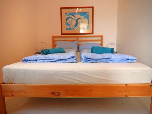 Postel nebo postele na pokoji v ubytování Ferienhaus am Garder See mit Panorama