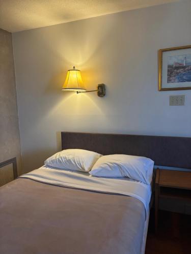 Postel nebo postele na pokoji v ubytování The Bridgewater Hotel