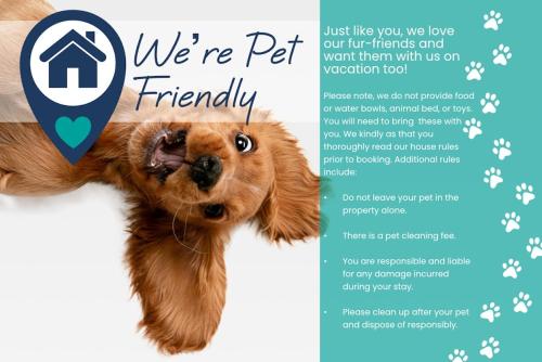 a flyer for a dog friendly facility with a picture of a dog head at Downtown Loft with Rooftop Hot Tub by StayIn in Fernie