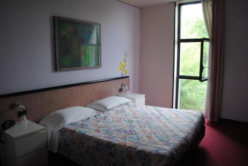 Cama o camas de una habitación en Hotel Giannina
