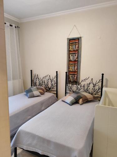 Letto o letti in una camera di Aristotelis Apartments