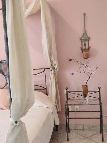 Letto o letti in una camera di Aristotelis Apartments
