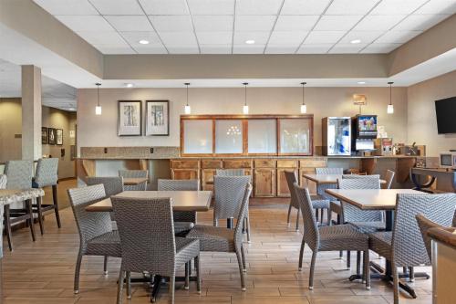 a dining room with tables and chairs at Best Western Plus City Center in Spokane