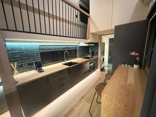 Kuchyň nebo kuchyňský kout v ubytování Wombat Creek Tiny House