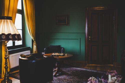 a living room with a couch and a table at Wohnung Wilhelm in Behren-Lübchin