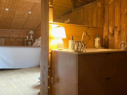 Postel nebo postele na pokoji v ubytování studio 'chalet rustique
