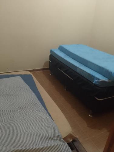 Katil atau katil-katil dalam bilik di Casa morada na serra