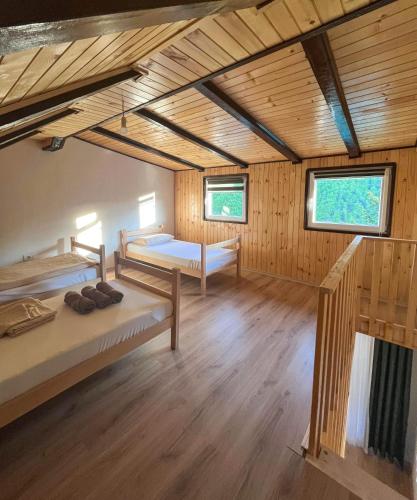 Postel nebo postele na pokoji v ubytování Hotel Melishta