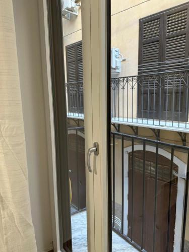 a view of a balcony from a door at Orologio21-Soggiorna al teatro Massimo in Palermo