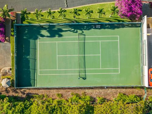 an overhead view of a tennis court on a field at Walk to Beach from this Renovated Studio with King Bed and Resort-Level Amenities in Wailea