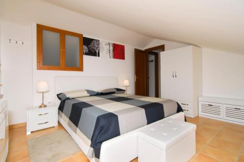 A bed or beds in a room at Dominella 2