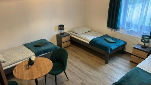 Una cama o camas en una habitación de Krause Park