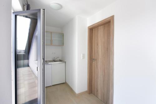 Dapur atau dapur kecil di Hotel New In Guesthouse