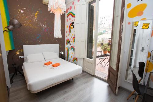 Ένα ή περισσότερα κρεβάτια σε δωμάτιο στο ZOOROOMS Boutique Guesthouse