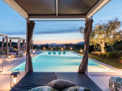 a swimming pool with a view from a house at 10 Bedrooms Villa in Lucca with pool in Montecarlo