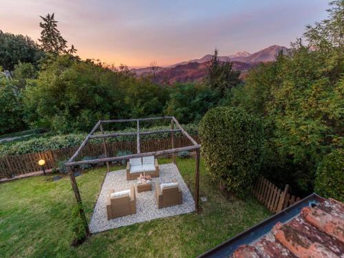 an aerial view of a backyard with a swing at Farmhouse in Tuscany with Pool and Scenic Views in Chiatri