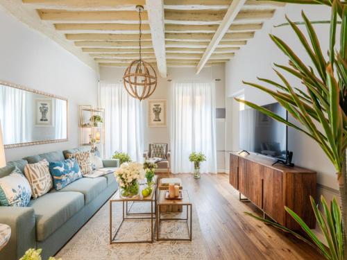 a living room with a couch and a table at Apartment in Montecarlo near Wine Region in Montecarlo