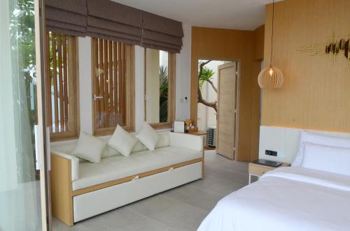 Ένα ή περισσότερα κρεβάτια σε δωμάτιο στο Madusea Grand Villa มาดูซี แกรนด์ วิลล่า