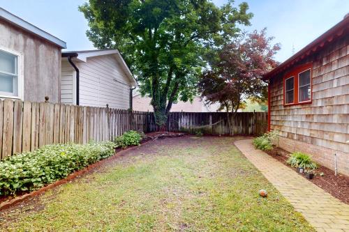 a yard next to a fence next to a house at Town of Lewes --- 107 E 4th St in Lewes