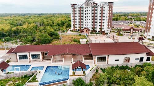 an aerial view of a hotel with a swimming pool at Seaview Condo in Royal Oceancrest Panglao in Dauis