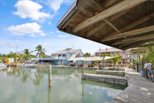 a view of a body of water with buildings at Coral Palm by AvantStay Key West Walkable Gated Community Shared Pool in Stock Island