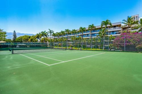 a tennis court in front of a building at Central Kihei Gem! 3-Min Walk to the Beach & Shops in Wailea